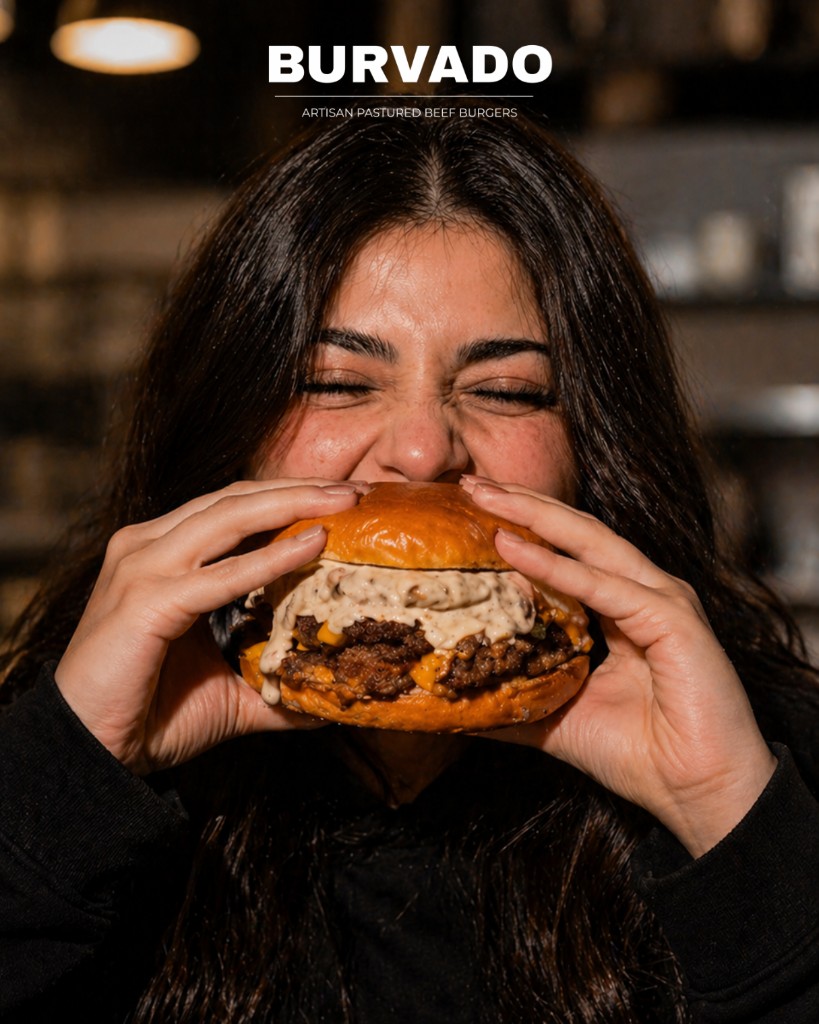 A Burvado burger, mid bite